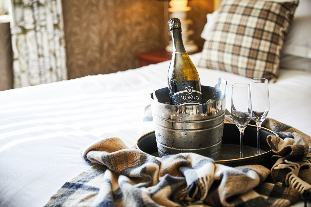 bottle of prosecco in hotel room